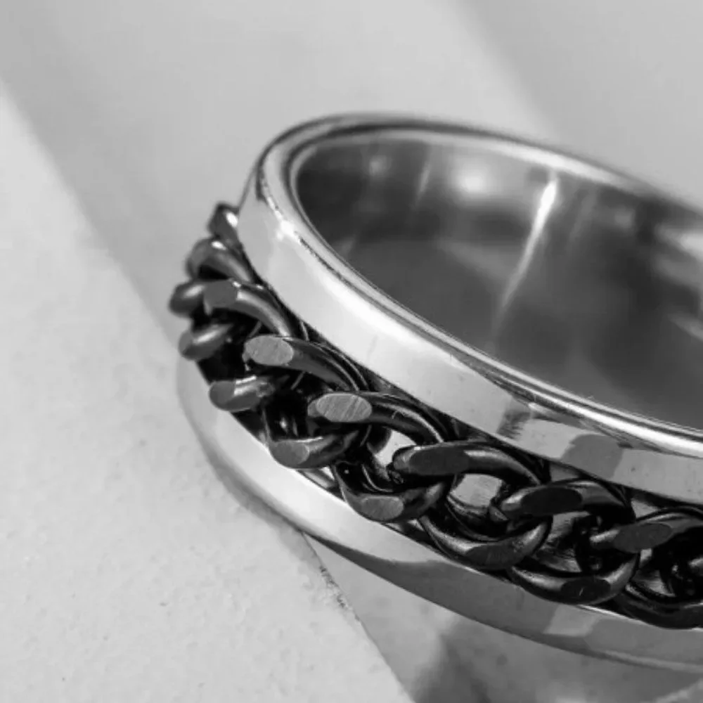 SILVER STAINLESS STEEL BLACK BRAIDED RING